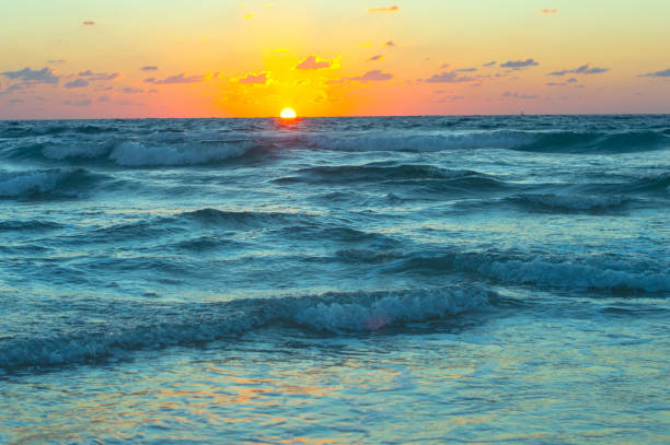 sea waves close up at sunrise