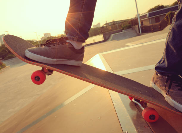 istock skateboarder legs skateboarding on skatepark ramp 869468708