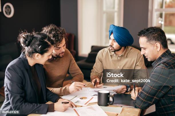 Group Of People Discussing New Strategies Stock Photo - Download Image Now - Indian Ethnicity, Office, Teamwork