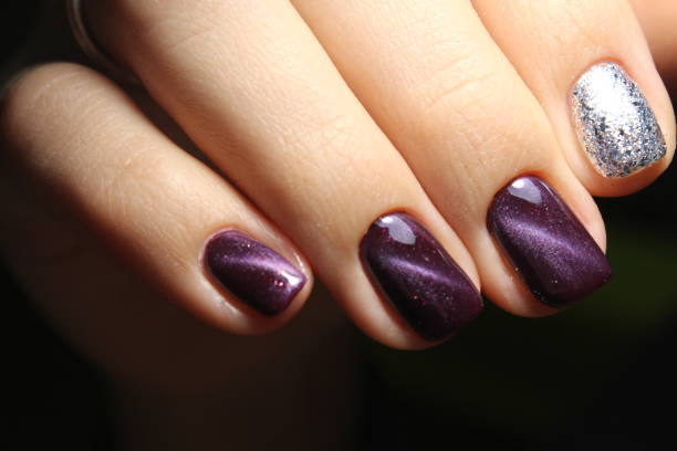 istock Nails. The design of broken glass. 869473520
