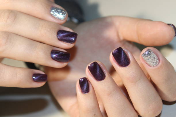 istock Nails. The design of broken glass. 869473868