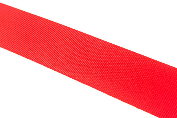 istock Silk red ribbon isolated on white 869474994