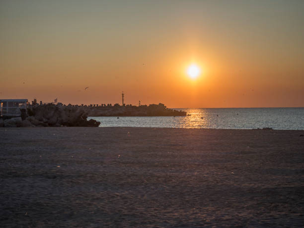 istock Sunrise over the Black Sea (Romania). 869478096