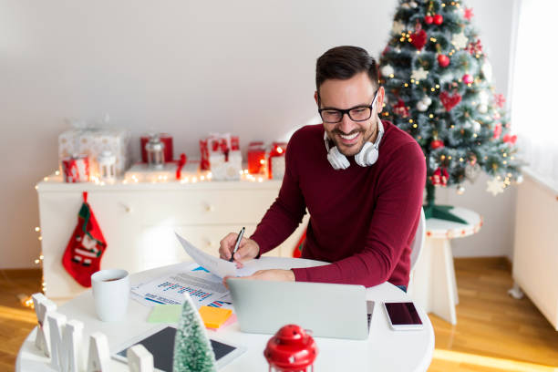 istock Freelancing from home during Christmas time 869478226