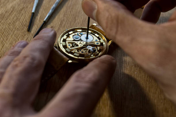 istock Watchmaker is repairing the mechanical watches in his workshop 869481594