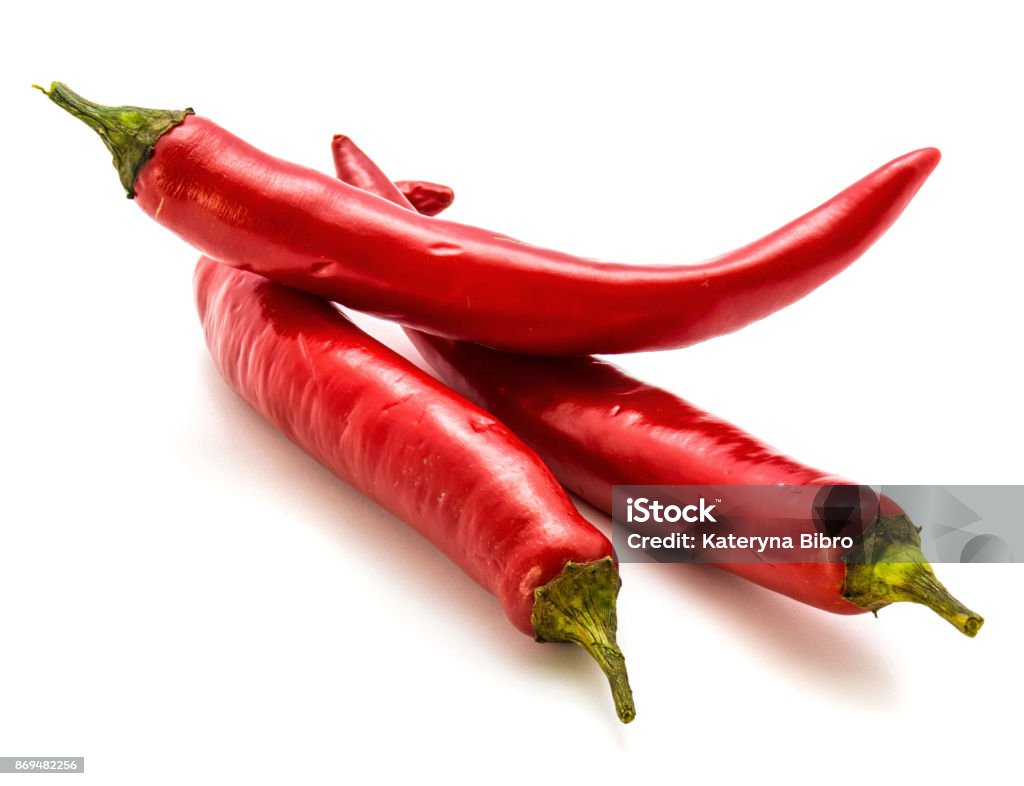 Chilli pepper Group of three red Chilli isolated on white background Pepper - Vegetable Stock Photo