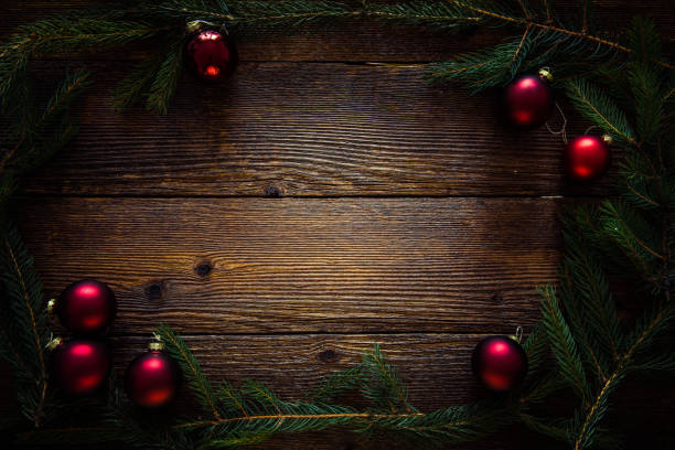 istock Christmas greetings. Red balls, fir tree, space for text 869485124