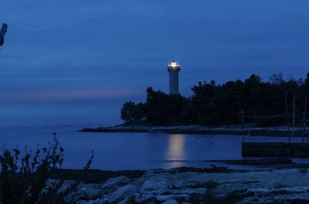 istock Lighthouse in the night in Savudrija / Croatia 869492682