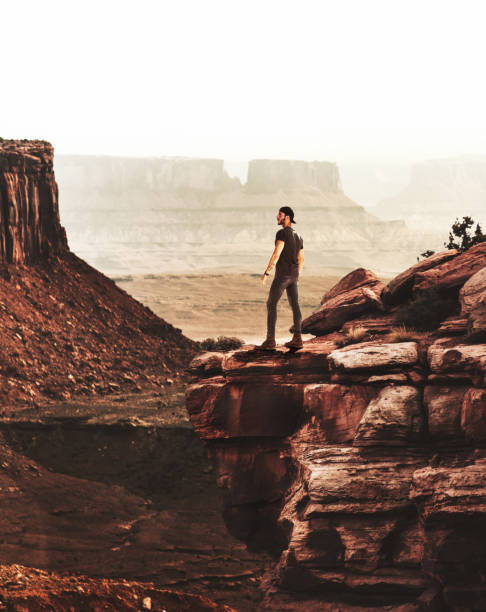 istock man on top of canyonlands 869499182