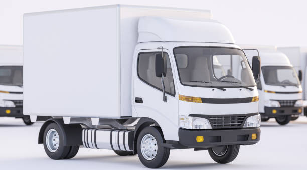 istock White Commercial Truck with Several Others in Background 869499994