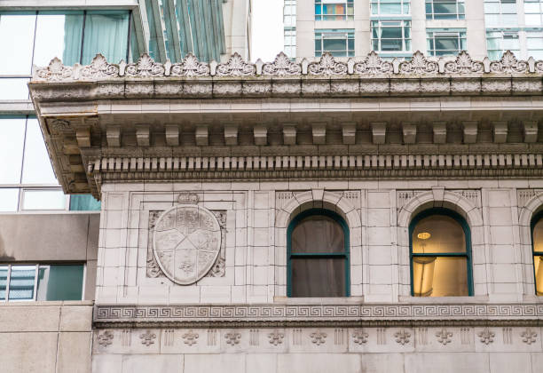 istock Windows and Ornate Detail on Stone Building 869502640