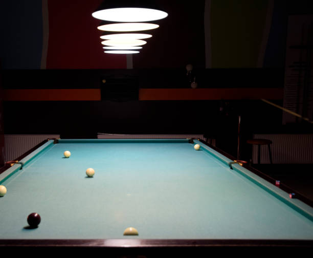 istock Russian billiards. Playing billiards in a nightclub. 869502736