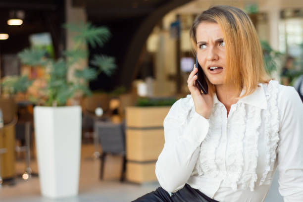 istock Businesswoman talking on phone 869502872
