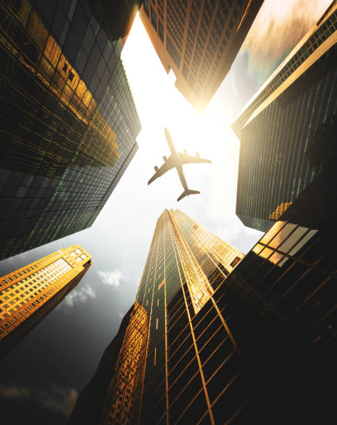 istock airplane flying in manhattan downtown 869506112