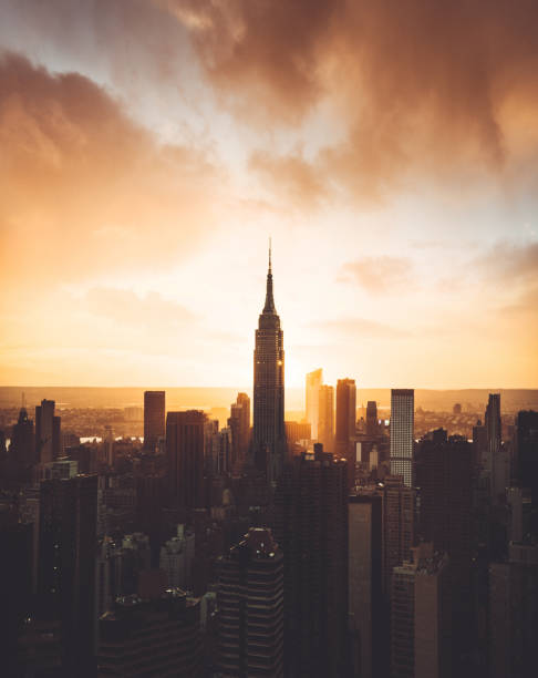 istock empire state building aerial view at dusk 869506356
