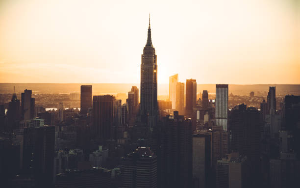 istock empire state building aerial view at dusk 869506444