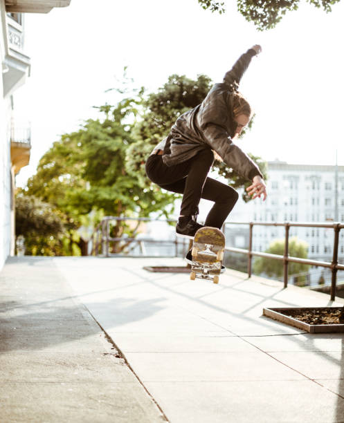 istock hipster with his skateboard on san francisco 869514262