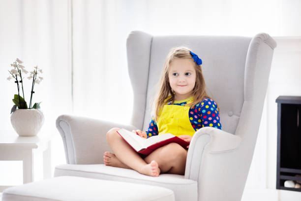 istock Child reading book. Kids read books. 869520968