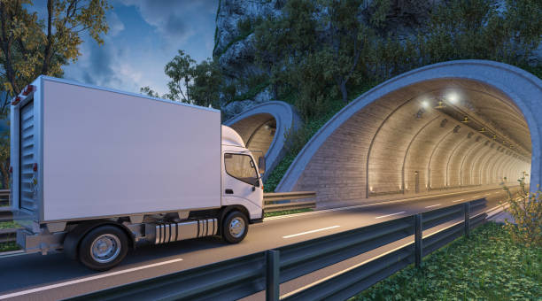 istock Delivery Truck Going through a Tunnel at Dusk 869523436