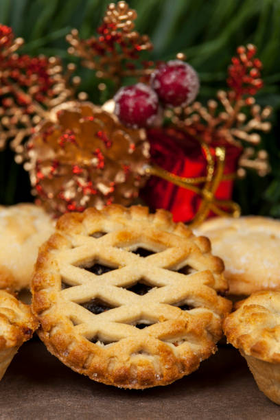 istock Lattice top mince pie and some christmas decorations 869527266