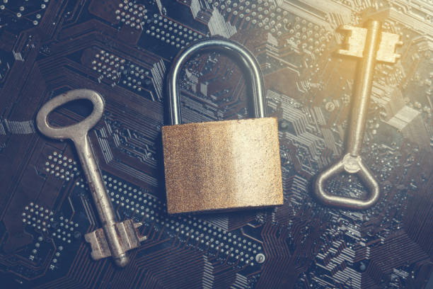 istock Padlock on computer motherboard with vintage keys. Internet data privacy information security encryption concept 869538690