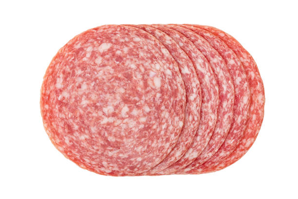 Sliced summer sausage salami isolated on white background, top view. Sliced summer sausage salami isolated on white background, top view salami stock pictures, royalty-free photos & images