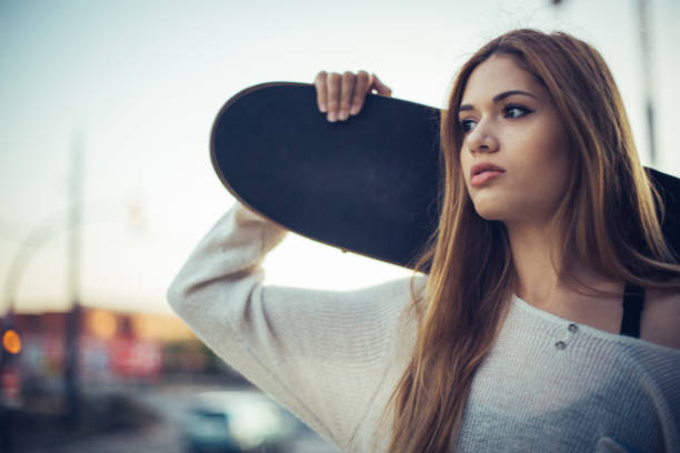 istock Beautiful skater woman 869551628