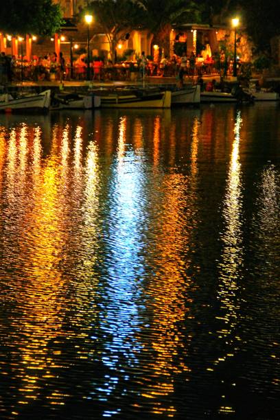 istock Agios Nikolaos Crete Greece at Night 869564290