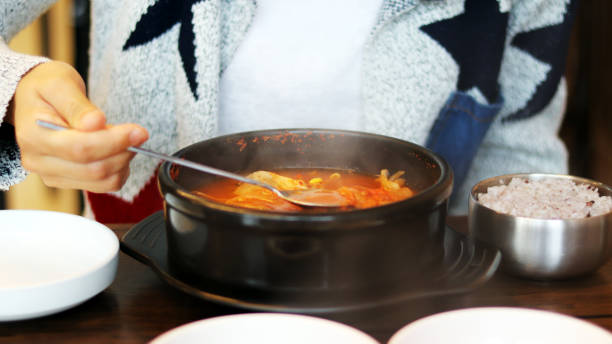 istock A woman who eats Korean breakfast 869571022