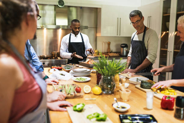 istock Group of friends are cooking in the kitchen 869576714