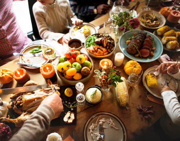 istock People are celebrating Thanksgiving day 869577306