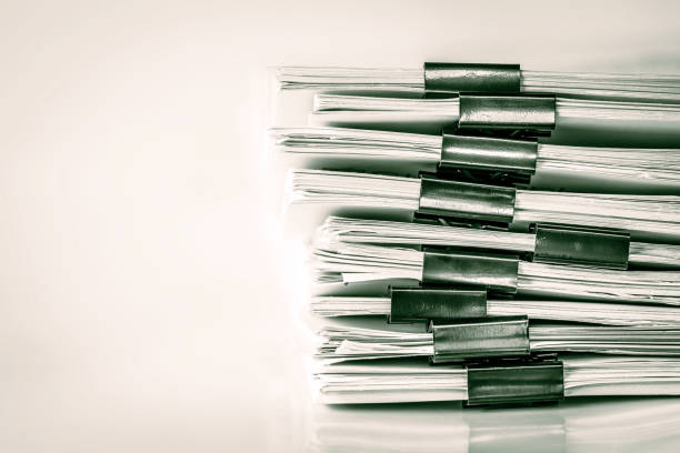 istock extreamly close up  the stacking of office working document with paper clip folder 869577558
