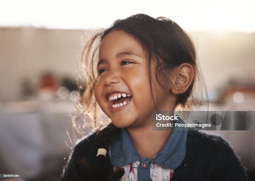 She's simply adorable Shot of an adorable little girl at home Child Stock Photo