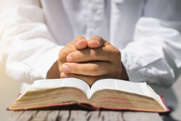 istock A man reading the Holy Bible. 869594418