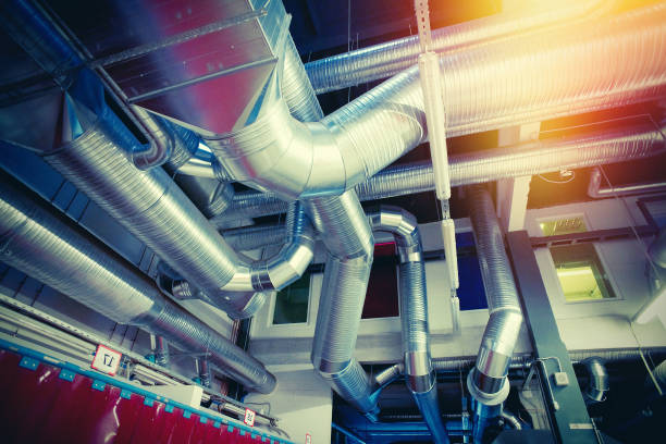 istock Industrial Steel pipelines, valves, cables and walkways 869594742