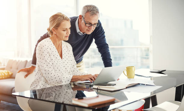 They take their joint investments seriously stock photo