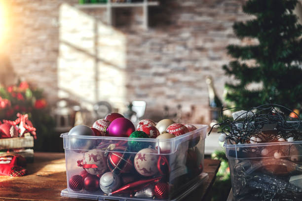 istock Decorating Christmas Tree with Ornaments and Christmas Lights 869598590