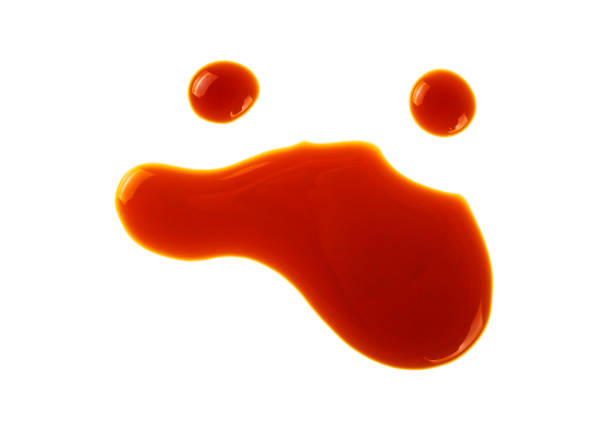 istock Puddle of soy sauce on white background 869599778