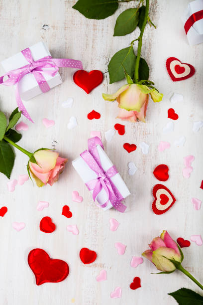 istock Pink roses,  gift and hearts 869606596