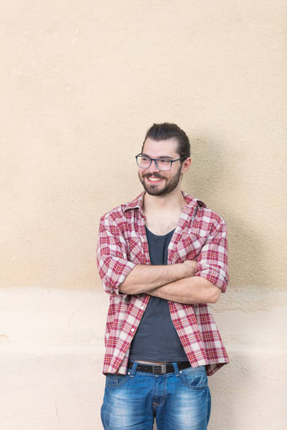 istock Handsome young man posing in front of the camera. 869613586