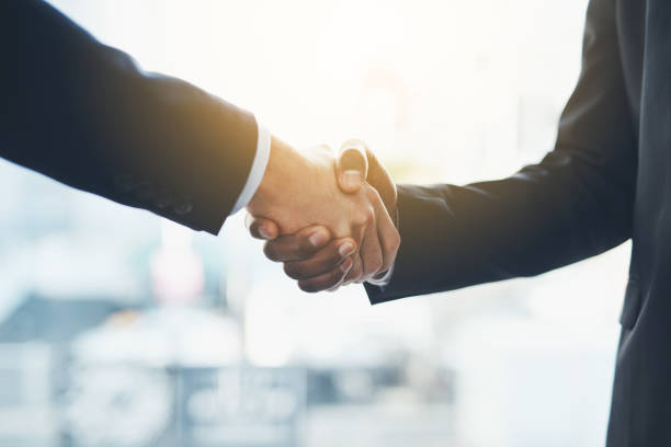 istock Here's to accomplishing mutual success 869614912