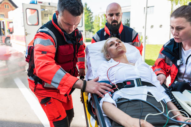 Paramedics Providing First Aid stock photo