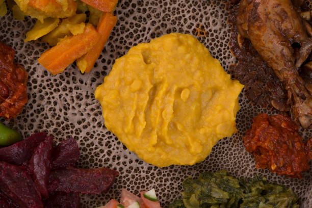 istock Close up Injera with beyaynetu sauces. 869617674