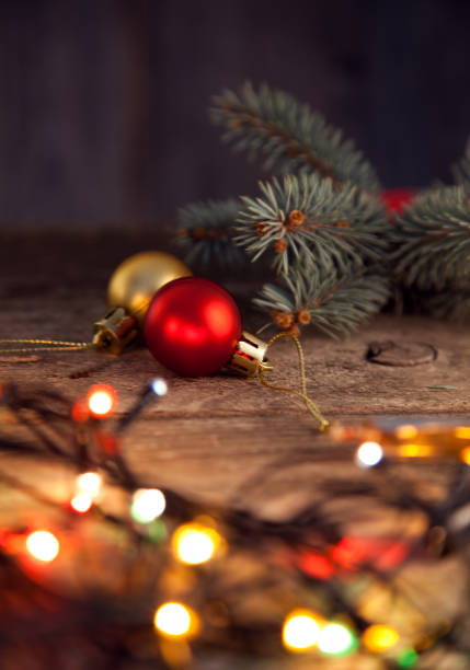 istock Christmas ornaments on a table with nice festive background Xmas illuminations 869617834