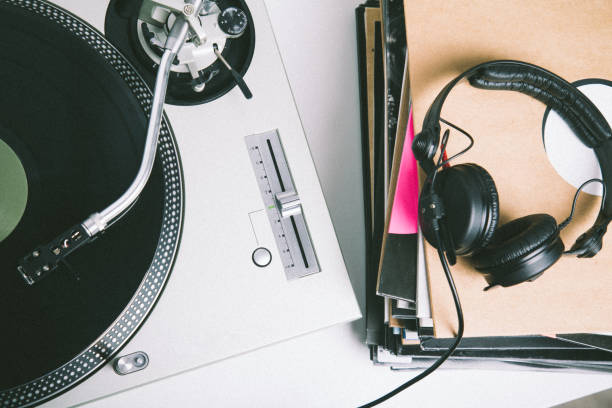 istock Turntable and vinyl records closeup 869619218