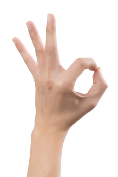 istock Man hand in OK sign on a white isolated background 869619698