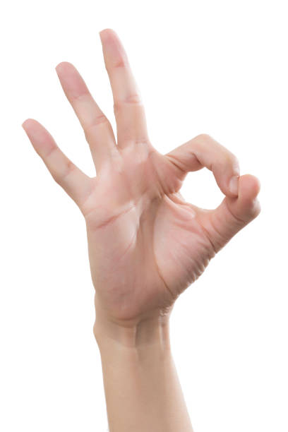 istock Man hand in OK sign on a white isolated background 869619740