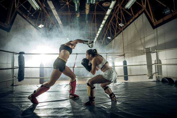 istock Escaping the punch during kickboxing match! 869630238