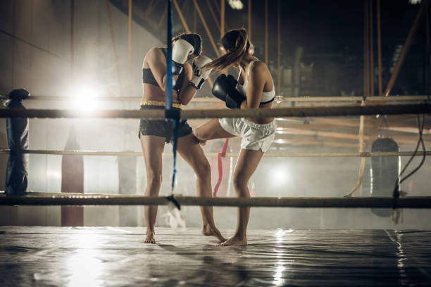 istock Women's kickboxing match in a ring! 869630420