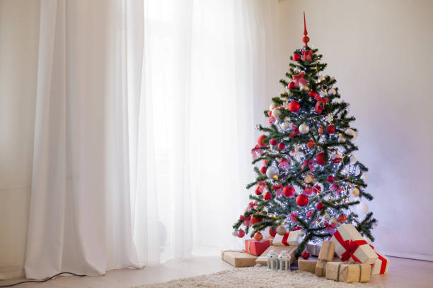 istock new year Christmas tree decor Gifts Christmas 869630956